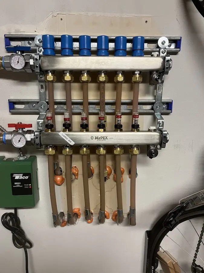 Plumber performing Gas Leak Detection at a residential property in Charlottesville